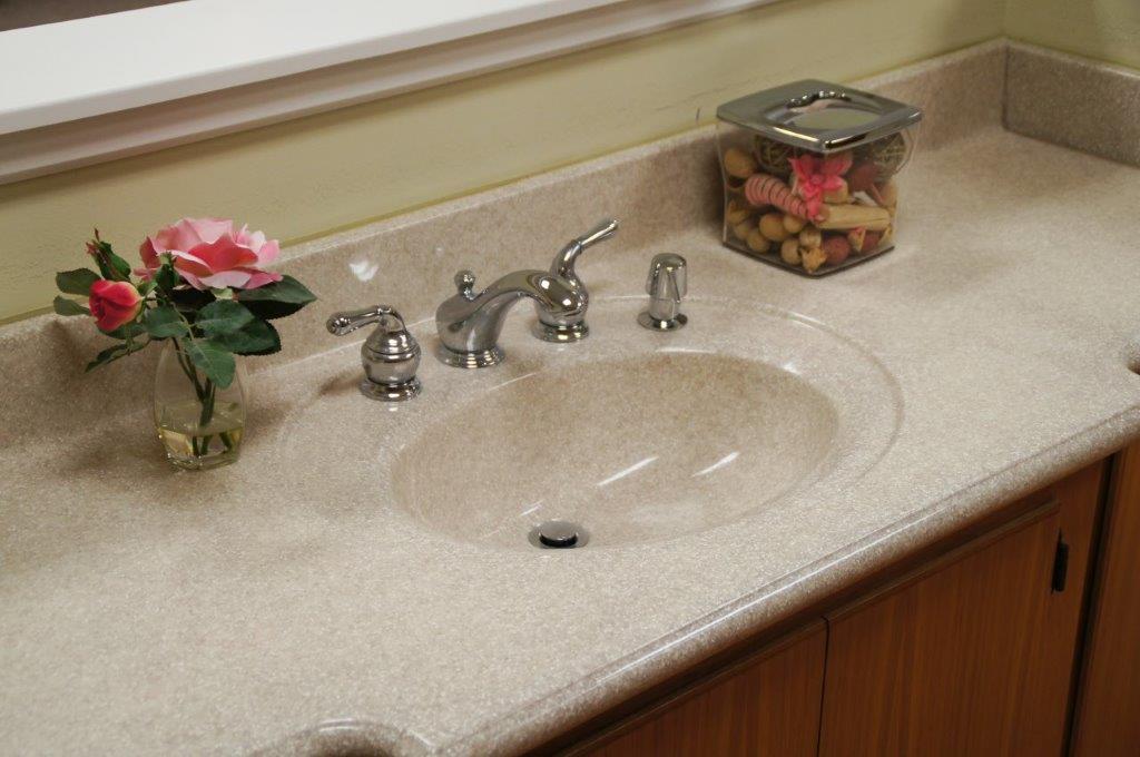 bathroom sink with flower vase